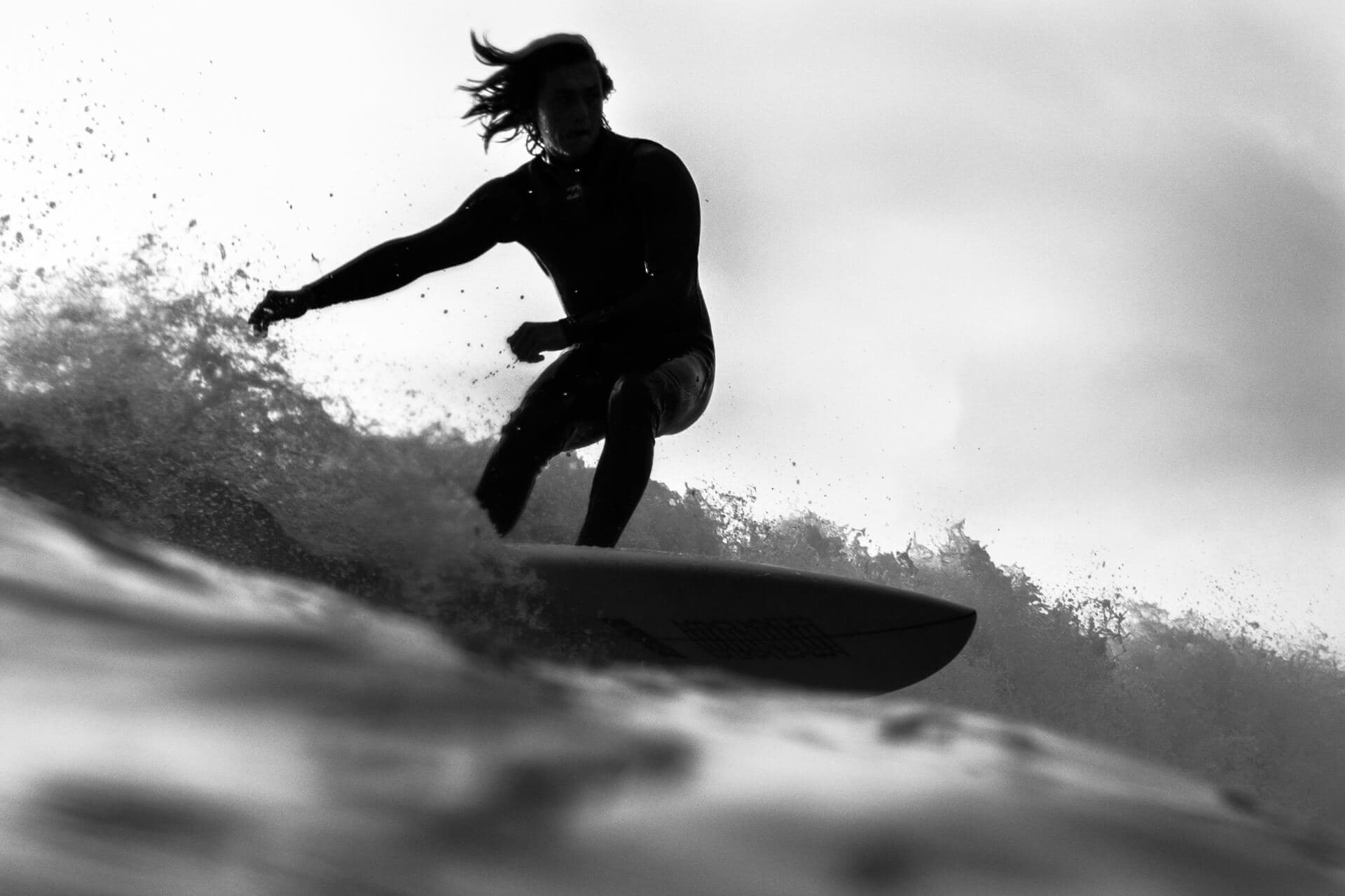 Person on surfboard by Jeremy Bishop